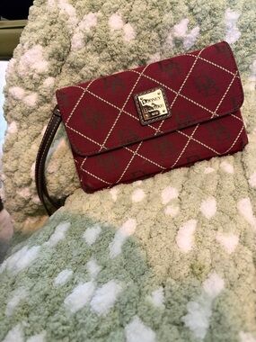 Dooney & Bourke Burgundy Logo Wristlet with Gold Plaque